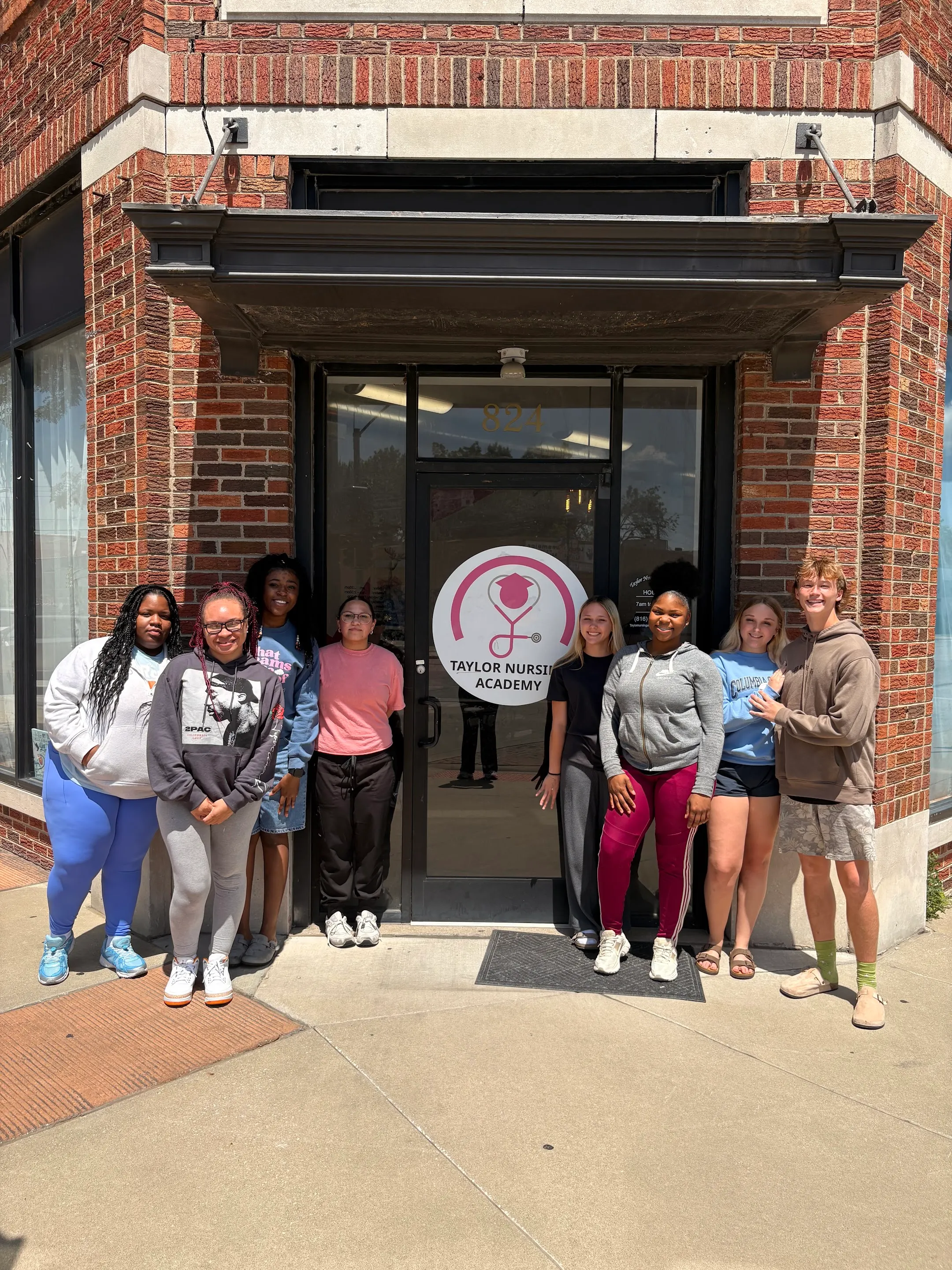 People outside the Taylor Nursing Academy entrance in Grandview