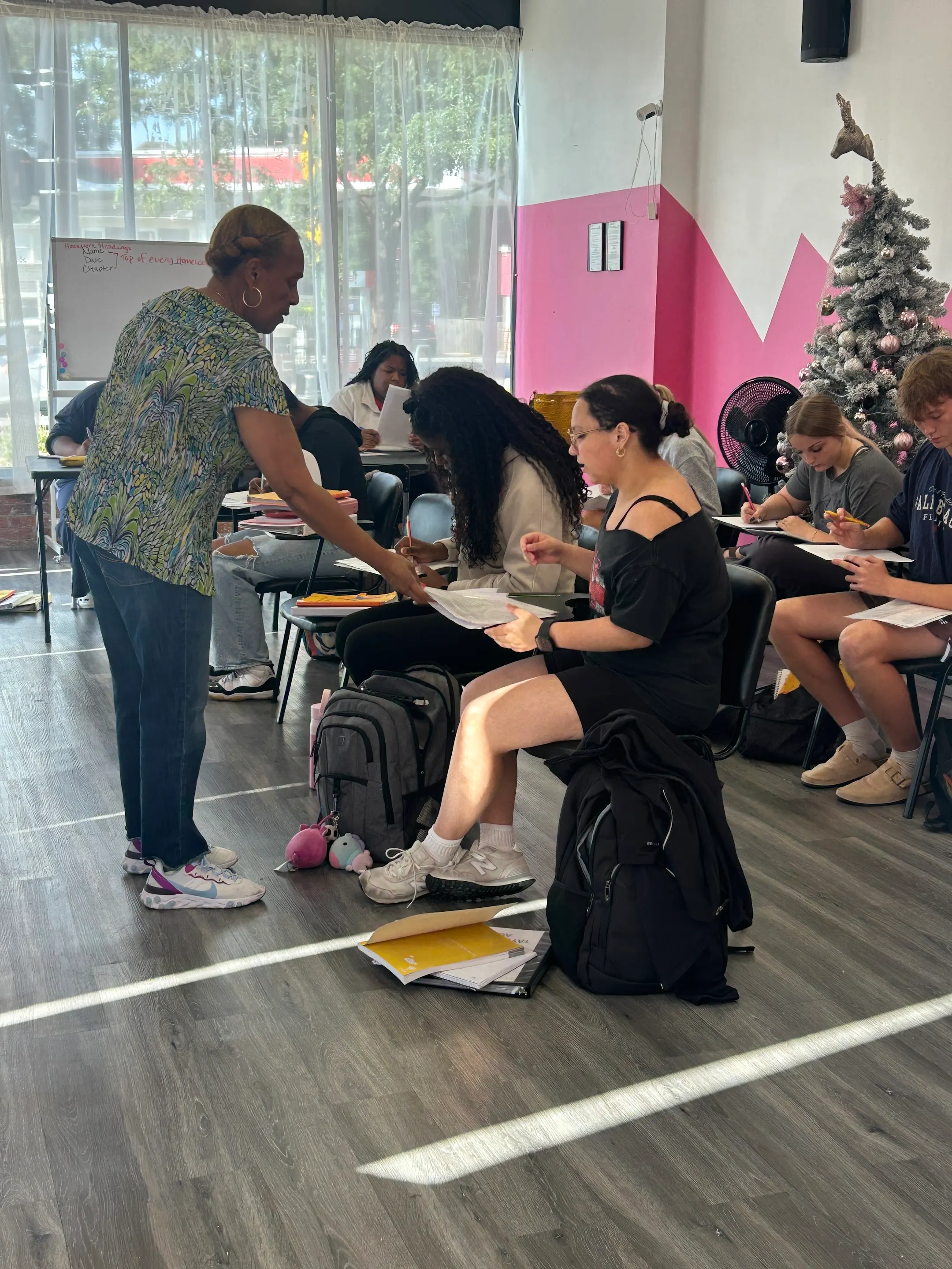 A Taylor Nursing Academy instructor and students learning in a classroom